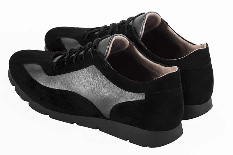 Matt black and dark silver women's open back shoes. Round toe. Flat rubber soles. Rear view - Florence KOOIJMAN